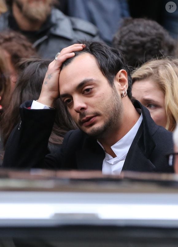 Roman de Kermadec (Fils de Kate Barry) - Sortie des obseques de Kate Barry en l'eglise Saint-Roch a Paris. Le 19 decembre 2013