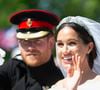 Selon The Sun qui reprend le livre Revenge écrit par Tom Bower, la mère du roi Charles aurait désapprouvé le fait que Meghan ait ignoré le protocole royal ce jour là

Le prince Harry, duc de Sussex, et Meghan Markle, duchesse de Sussex, en calèche au château de Windsor après la cérémonie de leur  mariage au château de Windsor, Royaume Uni, le 19 mai 2018.