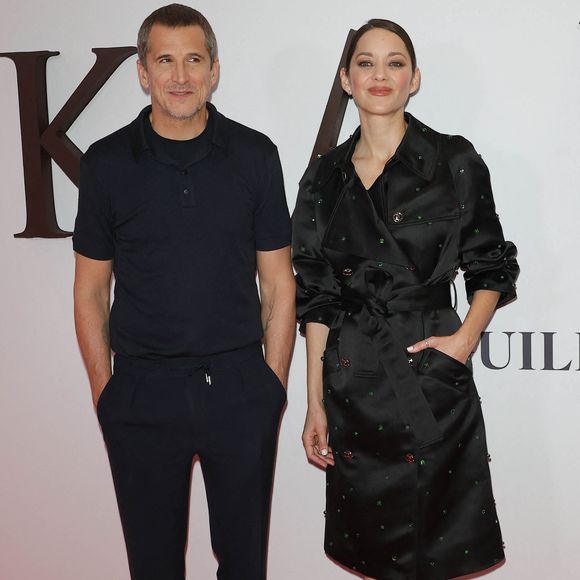Ces confidences paraissent alors qu'il s'apprête à retrouver le public avec Karma, son nouveau film attendu en salles le 21 octobre 2026, dans lequel il retrouve Marion Cotillard.

Guillaume Canet (réalisateur du film "Karma") et Marion Cotillard au photocall de la première du film "Karma" au cinéma Pathé Palace à Paris le 13 octobre 2026. © Coadic Guirec / Bestimage