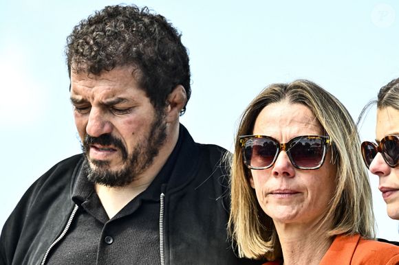 C'était une plage réputée dangereuse du Cap de Bonne-Espérance...


Jalil Narjissi avec sa femme Valérie et leur fille lors de l'inauguration d'un complexe sportif portant le nom de Medhi Narjissi, leur fils décédé lors d'un entrainement de rugby en Afrique du Sud.  Sainte-Colombe-en-Bruilhois, le 25 mai 2025. © Thierry Breton/PsnewZ/Bestimage