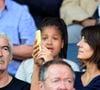 Raymond Domenech et sa femme Estelle Denis dans les tribunes lors du match de championnat de Ligue 1 Conforama opposant le Paris Saint-Germain au Racing Club de Strasbourg Alsace au Parc des princes à Paris, France, le 14 septembre 2019. Le PSG a gagné 1-0. © Jean-Baptiste Autissier/Panoramic/Bestimage