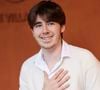 Sur son compte, elle a dévoilé un magnifique portrait d'Oscar, accompagné d'un message vibrant d'amour maternel. "Oscar, 23 ans de ta lumière, joyeux anniversaire mon fils chéri. Je t'aime".

Oscar Bruel au village (night session) lors des Internationaux de France de tennis de Roland Garros 2024, à Paris, France, le 31 mai 2024. © Jacovides-Moreau/Bestimage