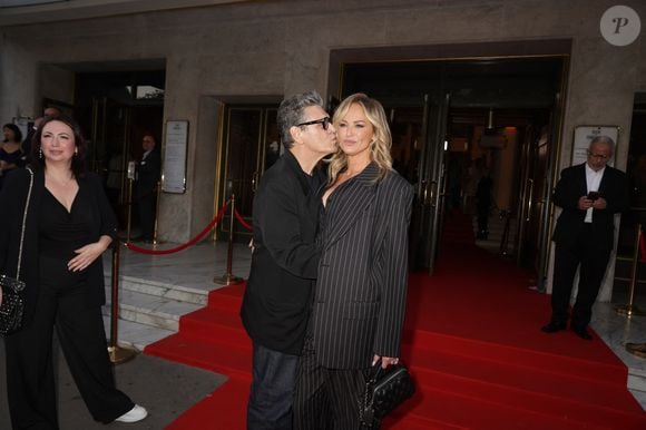 Marc Lavoine et sa compagne Adriana Karembeu arrivant au "Concerto pour la Paix" organisé par Omar Harfouch au Théâtre des Champs Élysées à Paris, France, le 18 Septembre 2024. 

© Perusseau / Tribeca / Bestimage