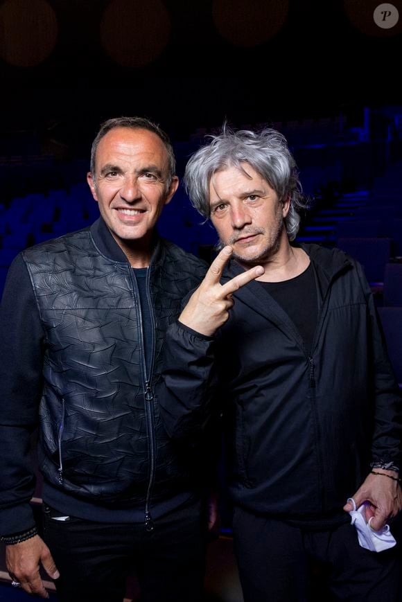 Exclusif - Nikos Aliagas et Nicola Sirkis - Vernissage de l'exposition photographique de Nikos Aliagas "Regards Miroirs" à la Seine Musicale à Boulogne-Billancourt le 14 avril 2022. © Cyril Moreau/Bestimage