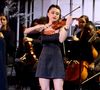 mais aussi de la violoniste Esther Abrami.

Esther Abrami lors surprises lors de l'enregistrement de l'émission "La chanson secrète N°14", présentée par N.Aliagas et diffusée le 26 décembre sur TF1, consacrée à Isabelle Ithurburu à Paris, France, le 9 décembre 2025. © Jacovides-Moreau/Bestimage
