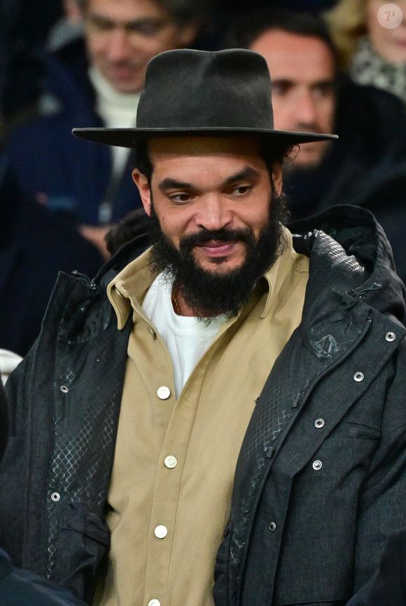 Joakim Noah - Célébrités dans les tribunes lors du match de Ligue des Champions entre le Paris Saint Germain contre Tottenham Hotspur Football Club (5-3) au Parc des Princes à Paris le 26 novembre 2025. © Christian Liewig/Bestimage