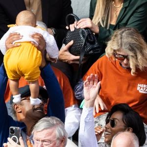 Yannick Noah, sa compagne Malika et leur fille Keelaani lors de l'hommage à R.Nadal lors des internationaux de France de tennis à Roland Garros le 25 mai 2025. © Jacovides / Moreau / Bestimage