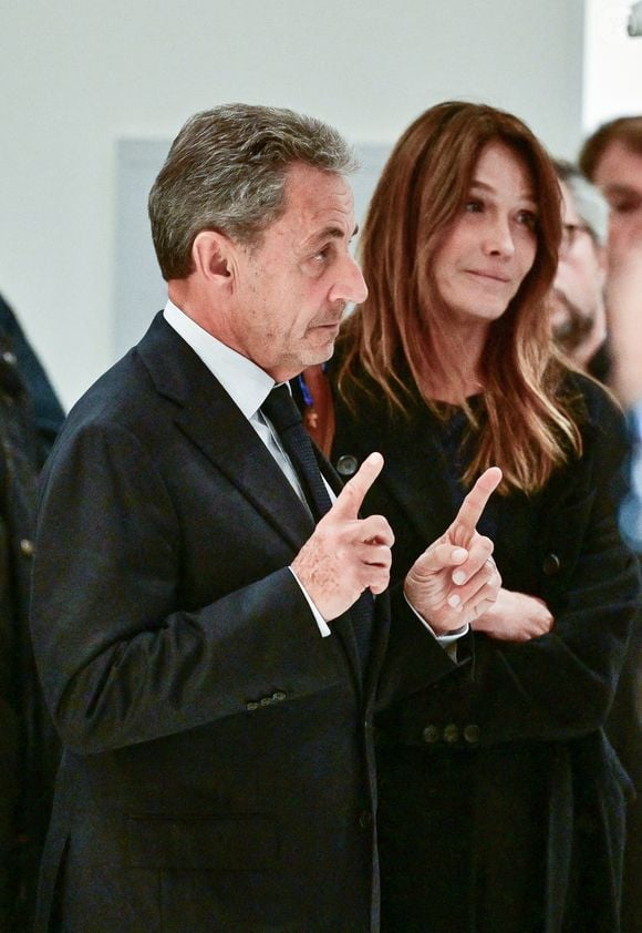 Nicolas Sarkozy et sa femme Carla Bruni - Nicolas Sarkozy condamné à 5 ans de prison à l'issue du procès de l'affaire du financement libyen au tribunal correctionnel de Paris, le 25 septembre 2025. L'ancien chef de l'Etat était accompagné de sa femme, C.Bruni. Nicolas Sarkozy, jugé coupable d’association de malfaiteurs, sera prochainement convoqué en vue de lui signifier la date de son incarcération. 
© Christian Liewig / Bestimage