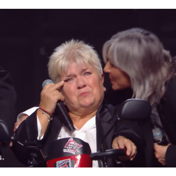 Mimie Mathy est de retour dans la troupe des Enfoirés 

Mimie Mathy en pleurs dans le spectacle des Enfoirés diffusé vendredi prochain sur TF1. Moment extrait du reportage diffusé samedi 1er mars 2025 dans "Grands reportages"