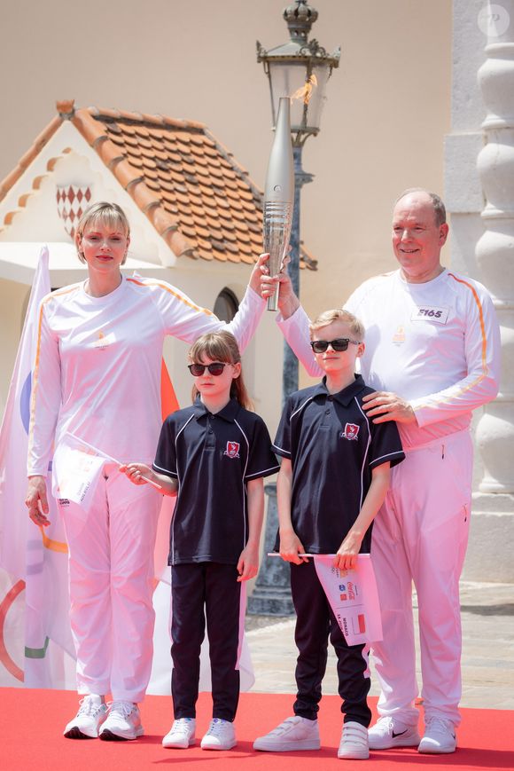 No Tabloïds - Princess Charlene of Monaco (La princesse Charlène de Monaco), Prince Albert II of Monaco (Le prince Albert II de Monaco), Prince Jacques of Monaco (Le prince Jacques de Monaco, marquis des Baux), Princess Gabriella of Monaco (La princesse Gabriella de Monaco, comtesse de Carladès) lors du relais de la Flamme Olympique des Jeux olympiques d'été de Paris 2024 à Monaco, le 18 juin 2024. Paris se prépare à accueillir les XXXIIIèmes Jeux Olympiques d'été, du 26 juillet au 11 août 2024. Olivier Huitel/Pool Monaco/Bestimage