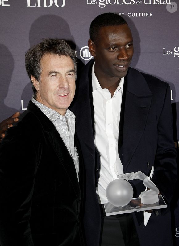 François Cluzet et Omar Sy à la cérémonie des Globes de Cristal en 2012, au Lido. © Guillaume Gaffiot /Bestimage