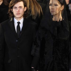 Céline Dion et son fils René-Charles lors des funérailles de l'agent d'artistes canadien René Angelil, le mari de la chanteuse Céline Dion, à la basilique Notre-Dame (où le couple s'est marié en 1994), à Montréal, Canada, le 22 janvier 2016.  Photo Robin Psaila-Papixs Press/ABACAPRESS.COM