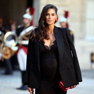 Tatiana Silva (enceinte, ancienne miss Belgique) arrivant au dîner d'état au palais de l'Elysée à Paris en l'honneur de la visite du roi et de la reine de Belgique en France le 14 octobre 2024.

© Dominique Jacovides / Bestimage