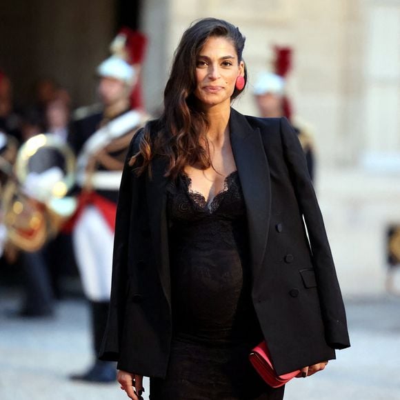 Tatiana Silva (enceinte, ancienne miss Belgique) arrivant au dîner d'état au palais de l'Elysée à Paris en l'honneur de la visite du roi et de la reine de Belgique en France le 14 octobre 2024.

© Dominique Jacovides / Bestimage