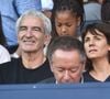 Raymond Domenech et sa femme Estelle Denis dans les tribunes lors du match de championnat de Ligue 1 Conforama opposant le Paris Saint-Germain au Racing Club de Strasbourg Alsace au Parc des princes à Paris, France, le 14 septembre 2019. Le PSG a gagné 1-0. © Giancarlo Gorassini/Bestimage