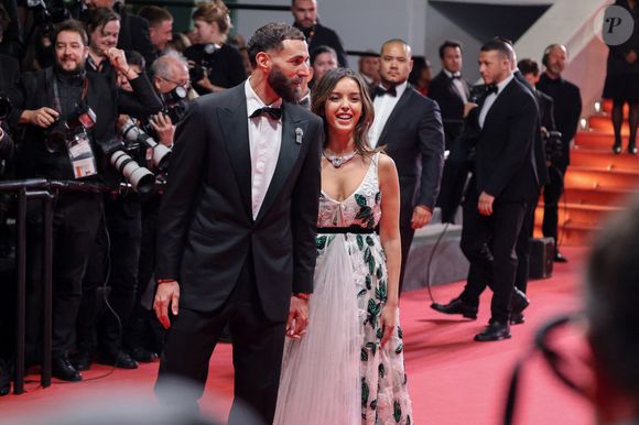 Karim Benzema et sa compagne Lyna Khoudri à la descente des marches du film « 13 jours 13 nuits » lors du 78ème Festival International du Film de Cannes. Le 23 mai 2025
© Jacovides-Moreau / Bestimage