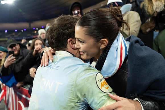 Exclusif - Antoine Dupont, Iris Mittenaere lors du match de rugby du Tournoi des Six Nations France contre Angleterre au Stade de France à Saint-Denis le 14 mars 2026.