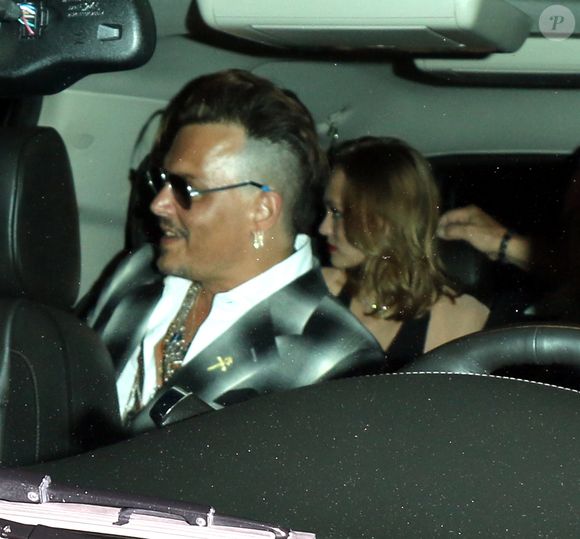 Johnny Depp et ses enfants Lily-Rose et Jack John Christopher, sortent du restaurant "Ago" à Los Angeles, le 29 juin 2016.
© CPA/Bestimage