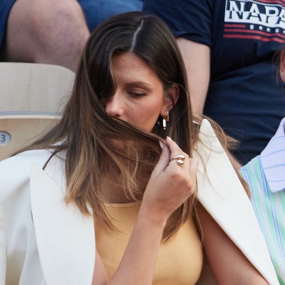 Camille Cerf (Miss France 2015), enceinte dans les tribunes lors des Internationaux de France de Tennis de Roland Garros 2023. Paris, le 7 juin 2023. © Jacovides-Moreau / Bestimage