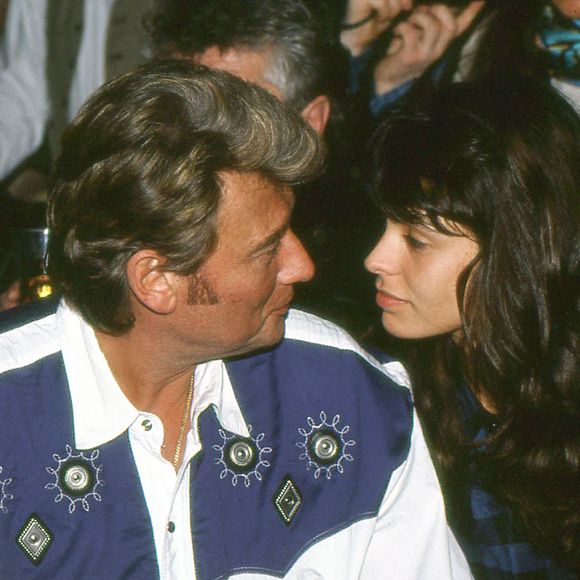 Adeline Blondieau et Johnny Hallyday lors d'une soirée au Palace en 1991

©BestImage