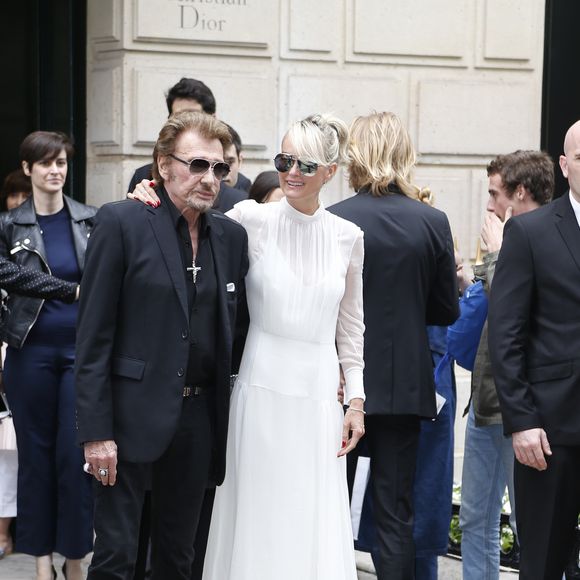 Johnny Hallyday et sa femme Laeticia - Arrivées au défilé de mode Haute-Couture automne-hiver 2016/2017 "Christian Dior" à Paris. Le 4 juillet 2016