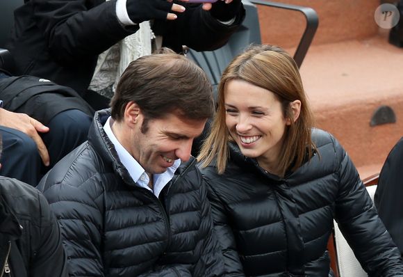 Isabelle Ithurburu et Gonzalo Quesada - People aux Internationaux de France de tennis de Roland Garros à Paris, le 28 mai  2014 lors du match entre Jo-Wilfried Tsonga et Jürgen Melzer. © Dominique Jacovides/Bestimage