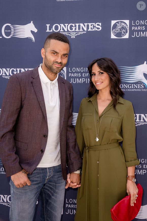 Exclusif - Tony Parker et sa femme Axelle Francine - People lors du Longines Paris Eiffel Jumping au Champ-de-Mars à Paris, le 5 juillet 2015.