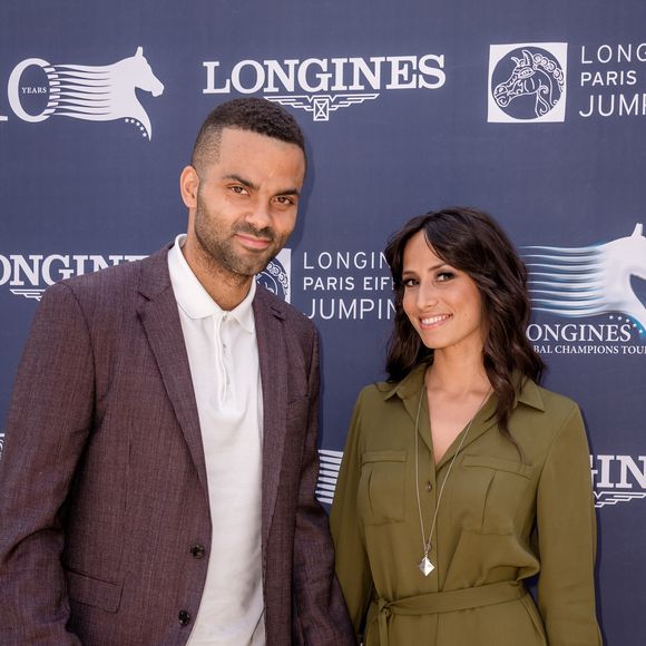 Exclusif - Tony Parker et sa femme Axelle Francine - People lors du Longines Paris Eiffel Jumping au Champ-de-Mars à Paris, le 5 juillet 2015.