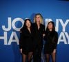 En ce jour où Johnny Hallyday aurait fêté son 82eanniversaire, sa femme Laeticia Hallyday a décidé de lui rendre un bel hommage en dévoilant une vidéo qu'il avait lui-même réalisée pour elle ainsi que pour ses filles Jade et Joy.
Laeticia Hallyday et ses filles Joy et Jade - Photocall du vernissage de l'exposition "Johnny Hallyday, l'exposition" au Palais des Expositions à Paris. Le 21 décembre 2023
© Dominique Jacovides / Bestimage