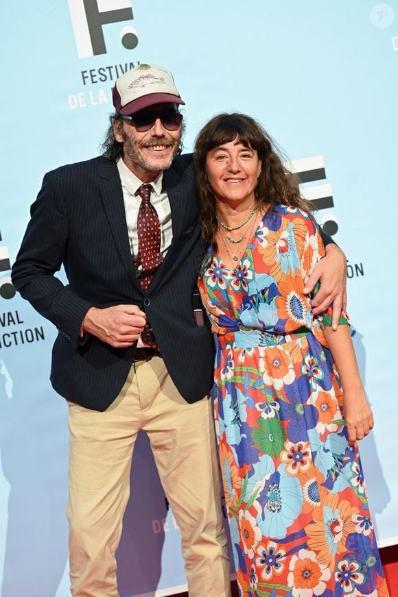 Philippe Rebbot, Romane Bohringer lors de la projection des trois premiers épisodes de la fiction "L'amour flou" lors du Festival de la Fiction de La Rochelle, le 15 septembre 2021

© MPP / Bestimage