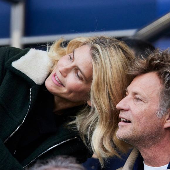 Alice Taglioni et son compagnon Laurent Delahousse - Célébrités dans les tribunes de la demi-finale retour de Ligue des champions entre le PSG face au Borussia Dortmund (0-1) au Parc des Princes à Paris le 7 mai 2024. © Cyril Moreau/Bestimage