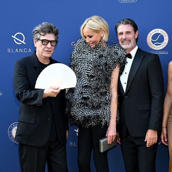 Marc Lavoine et sa compagne Adriana Karembeu et Patrick Mouratoglou - 11ème édition du Gala de charité de Patrick Mouratoglou à la Mouratoglou Academy & Resort à Biot le 21 juin 2025. Ce gala de prestige réunit chaque année les grandes figures du sport, du divertissement et de nombreux donateurs, mobilisés pour soutenir les jeunes talents du tennis mondial. © Bruno Bebert/Bestimage