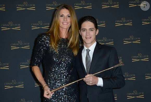 Elle avait été sacrée Miss France 1998 sur TF1

Sophie Thalmann, son mari Christophe Soumillon - 65ème édition des Cravaches d'Or au Théâtre des Champs-Elysées à Paris le 14 mars 2014. 
Crédit : COADIC GUIREC / BESTIMAGE