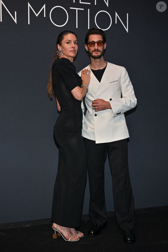 Natasha Andrews, Pierre Niney lors du dîner Kering Women In Motion au 78ème Festival de Cannes à Cannes, France, le 18 mai 2025. Photo by Julien Reynaud/APS-Medias/ABACAPRESS.COM