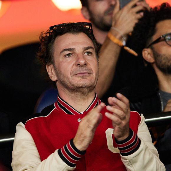 Michaël Youn - People dans les tribunes du match de Ligue des champions entre le PSG et le Borussia Dortmund (2-0) au Parc des Princes à Paris. © Cyril Moreau/Bestimage