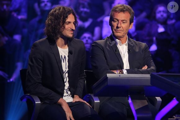 "C'était plaisant de réussir à remonter sept points de retard sur les finales en douze points. Je pense que les statistiques étaient un peu contre moi. Et ma cote au plus bas, quand Émilien menait 9 à 2. Je pense qu'on a écrit à tous les deux un scénario que personne n'aurait imaginé dans ses rêves" a-t-il ajouté, ravi d'avoir battu le plus grand maître de l'histoire du jeu.

Exclusif - Jean-Luc Reichmann joue avec Xavier Mercier, gagnant des 12 coups de midi au profit de l'Association SOS Addictions - Enregistrement à l'occasion des 15 ans de l'émission "Qui veut gagner des millions ?" sur TF1 au studio Carrère A de La Plaine Saint-Denis le 31 aout 2015 © Christophe Clovis / Bestimage