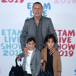 Jean-Roch et ses enfants assistant au défilé Etam hiver 2019/été 2020 dans le cadre de la semaine de la mode à Paris, en France, le 24 septembre 2019. Photo by Aurore Marechal/ABACAPRESS.COM