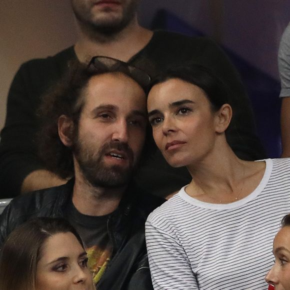 Elodie Bouchez et son mari Thomas Bangalter (groupe Daft Punk) dans les tribunes du stade de France lors du match de ligue des nations opposant la France à l'Allemagne à Saint-Denis, Seine Saint-Denis, France, le 16 octobre 2018.