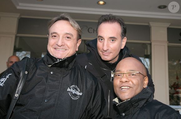 Les chanteurs français Mario Ramsamy, Jean-Louis Pujade et Emile Rousseau de 'Emile et images' arrivent au Pavillon Gabriel à Paris, France, le 20 décembre 2006 pour l'enregistrement de l'émission de Michel Drucker 'Vivement Dimanche'.