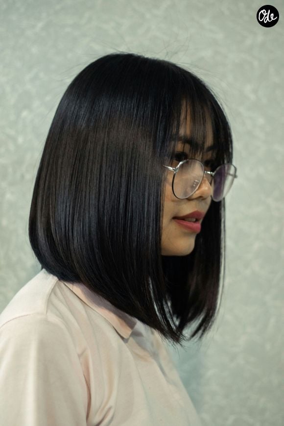 Avec sa longueur généralement située au niveau du menton, le layered bob se distingue du carré classique par une base moins uniforme. 

Unsplash / Dev Asamgbam