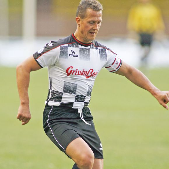Michael Schumacher lors d'un match de football caritatif opposant la Star Team aux pilotes de Formule 1, au stade Louis-II, à Monaco. © JUNIOR / BESTIMAGE