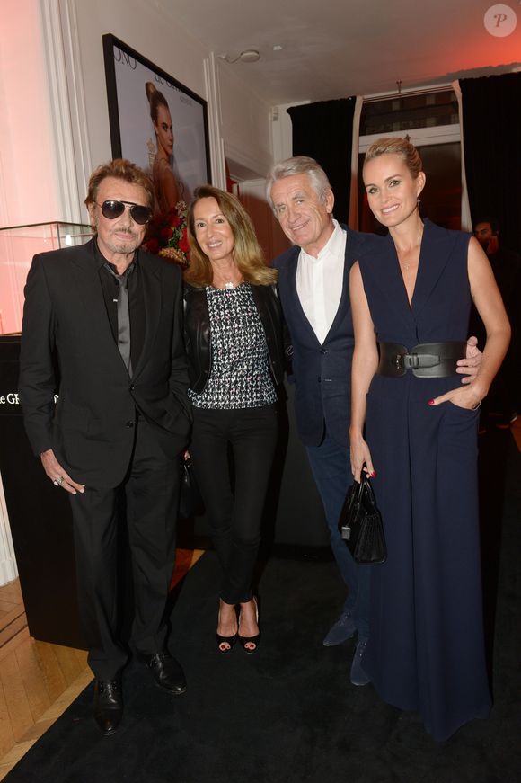Exclusif - Johnny Hallyday, Nicole et Gilbert Coullier, Laeticia Hallyday - Inauguration du Show Room Parisien De Grisogono et lancement de la montre "Crazy Skull" à Paris le 23 octobre 2014.