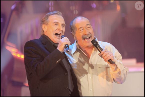 Pourtant, ces deux-là, qui se connaissent depuis leur jeunesse, ont d'abord été très, très proches,

Gérard Rinaldi et Jean Sarrus en 2008, dans "Les années Bonheur". BAHI / BESTIMAGE