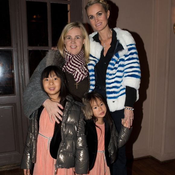 Exclusif - Prix Special - No web - No blog - Laeticia Hallyday, ses filles Jade et Joy, et Helene Darroze, la marraine de Joy et chef etoilee qui est co-presidente de l'association "La Bonne Etoile" - Aftershow apres le concert caritatif de Johnny Hallyday pour l'association de sa femme "La Bonne Etoile", qui vient en aide aux enfants du Vietnam, au Trianon a Paris, le 15 decembre 2013.
