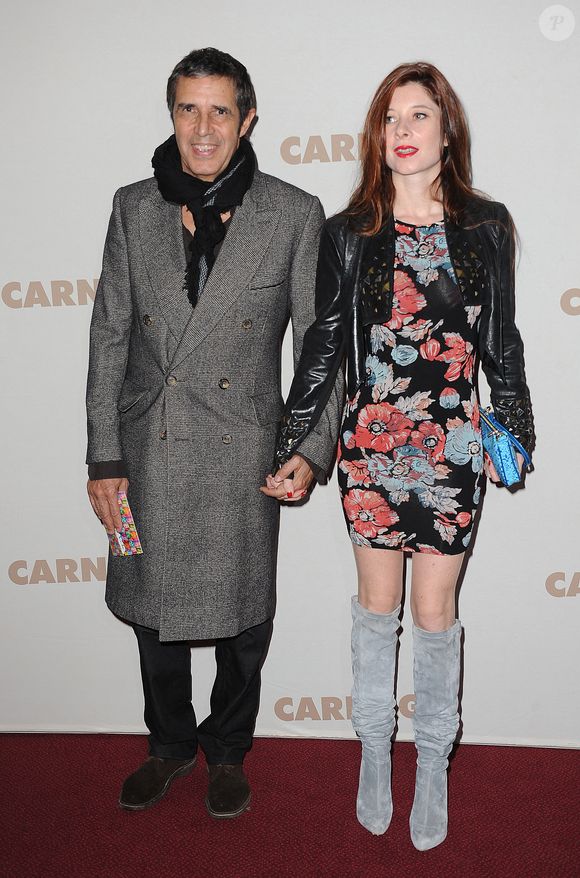 Julien Clerc et Hélène Gremillon assistent à l'avant-première de Carnage au cinéma Gaumont Marignan © Guillaume Gaffiot /Bestimage