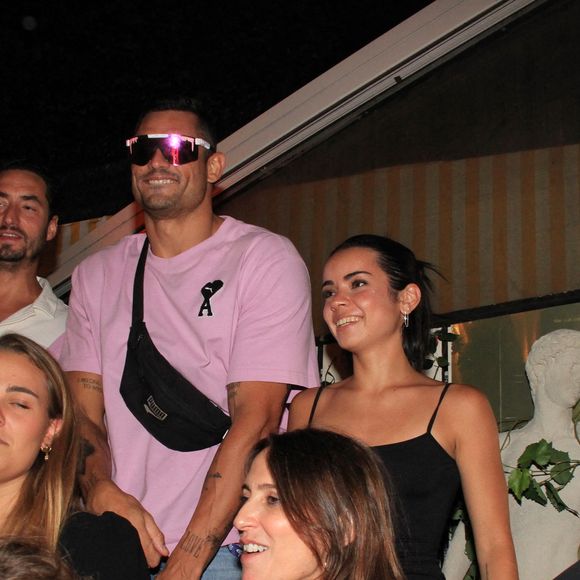 Exclusif  - Florent Manaudou et Lola Duménil lors d'une soirée au club L'Arc à Paris, à l'occasion des Jeux Olympiques Paris 2024. Le 8 août 2024. © BALDINI / BESTIMAGE