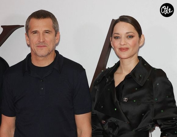 Parents de Marcel et Louise, ils restent discrets sur leur organisation familiale.

Guillaume Canet (réalisateur du film "Karma") et Marion Cotillard au photocall de la première du film "Karma" au cinéma Pathé Palace à Paris le 13 octobre 2026. © Coadic Guirec / Bestimage