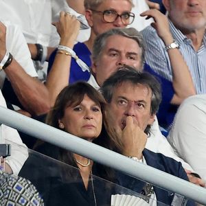 Jean-Luc Reichmann et sa femme Nathalie Lecoultre dans les tribunes lord du match d'ouverture de la Coupe du Monde de Rugby France 2023 avant le match de la Poule A entre la France et la Nouvelle-Zélande au Stade de France à Saint-Denis le 8 septembre 2023.  © Dominique Jacovides/Bestimage