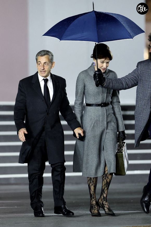 Nicolas Sarkozy et sa femme Carla Bruni arrivent à la cérémonie de réouverture de la cathédrale Notre-Dame de Paris, le 7 décembre 2024. 

© Agence / Bestimage