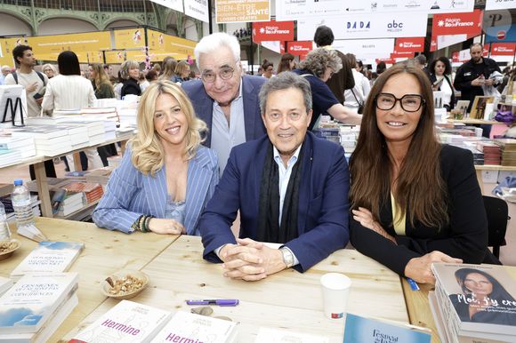 Georges Fenech avec sa compagne Marie Severine Trouban,  Nathalie Marquay Pernaut et Guy Tredaniel - Festival du Livre de Paris 2025 au Grand Palais à Paris le 12 avril 2025.
© Cédric Perrin / Bestimage
